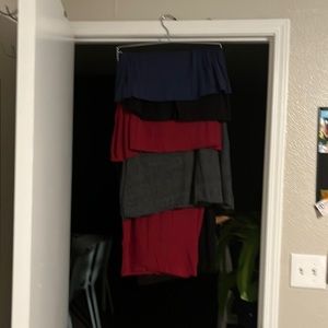 Lot of 4 maxi skirts, maroon, grey, navy, and black. Size medium.